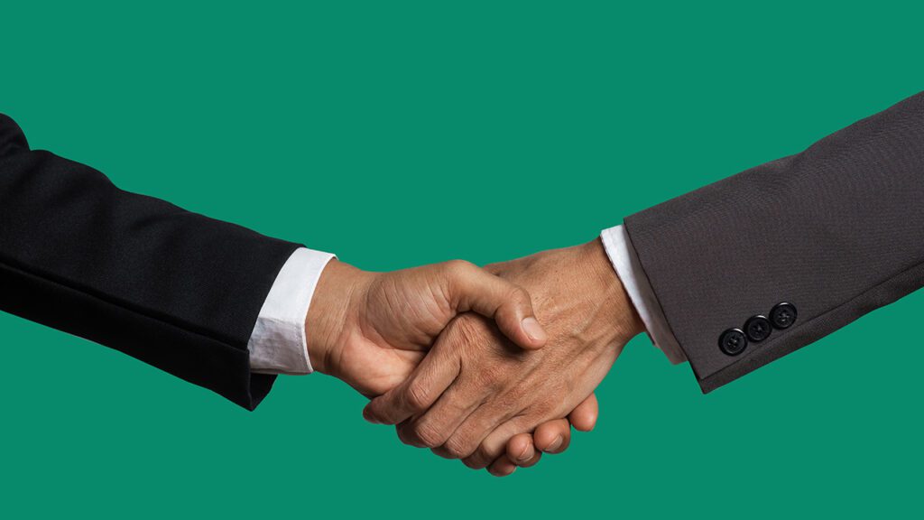 Business owners resolving conflict through mediation